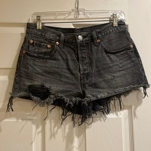 Levi’s black denim shorts with distressing
